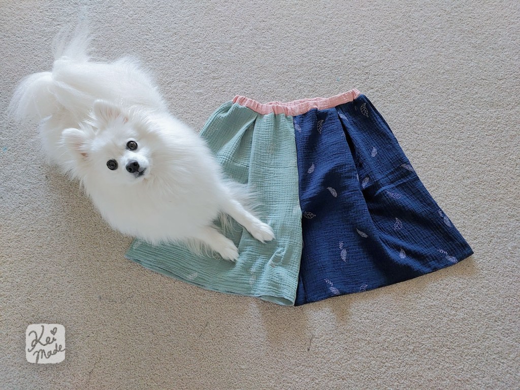 Japanese Spitz dog helping to sew culotte shorts